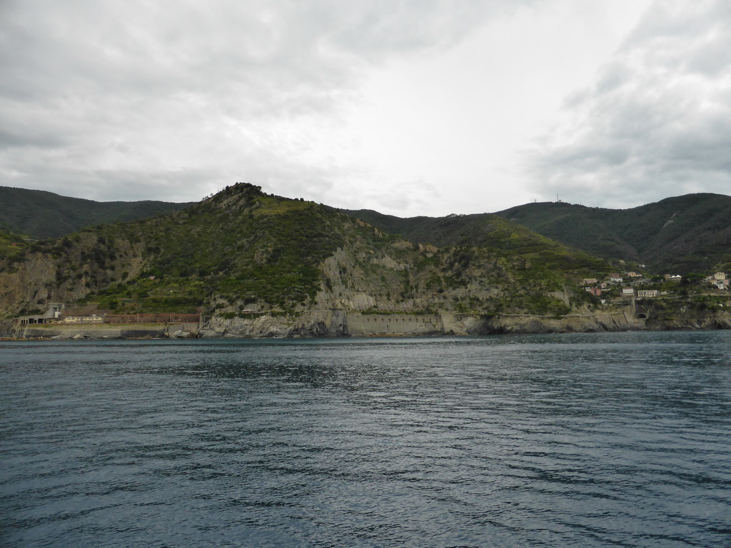 The railway station of Manarola, the Via dell`Amore path and Riomaggiore, viewed from the ferry