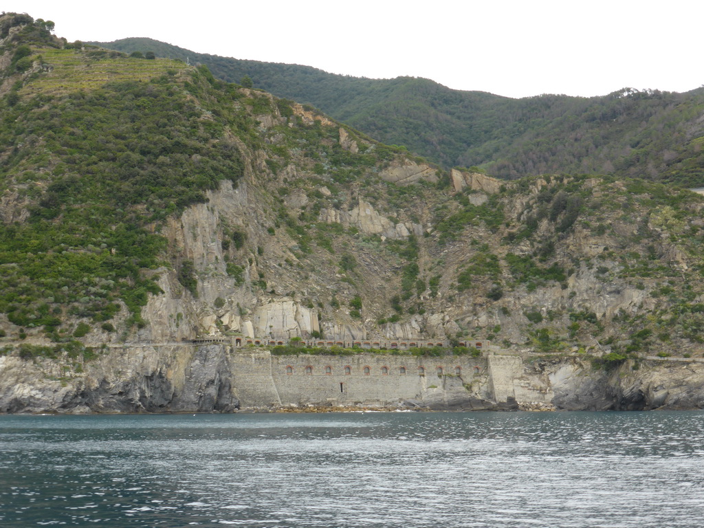 The Via dell`Amore path between Manarola and Riomaggiore, viewed from the ferry