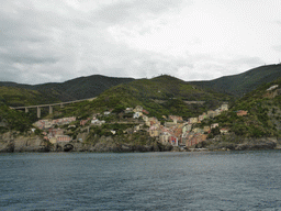 The new town and the old town of Riomaggiore, viewed from the ferry from Manarola