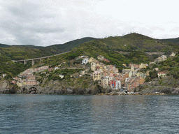 The new town and the old town of Riomaggiore, viewed from the ferry from Manarola