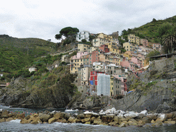 Riomaggiore and its harbour, viewed from the ferry from Manarola