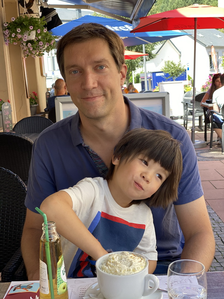 Tim and Max having drinks at the terrace of the La Maison De La Gaufre restaurant