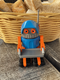 Robot toy at the terrace of the La Maison De La Gaufre restaurant