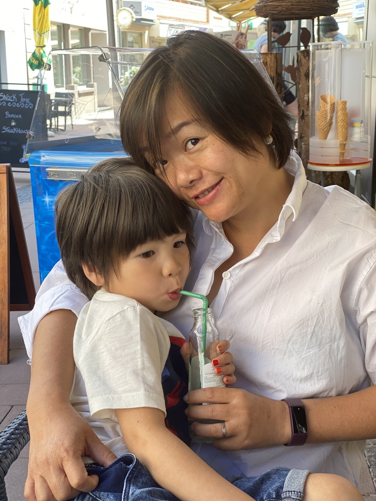 Miaomiao and Max having drinks at the terrace of the La Maison De La Gaufre restaurant