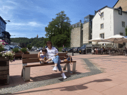 Miaomiao and Max on a bench at the Place du Marché square