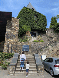 Miaomiao and Max at the southern staircase to Clervaux Castle, viewed from the Place du Marché square