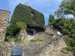 Miaomiao and Max at the southern staircase to Clervaux Castle, viewed from the Place du Marché square