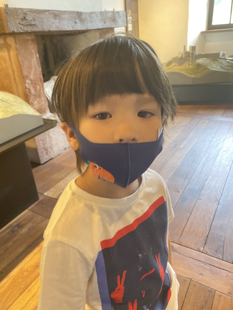 Max with a facial mask at the Museum of Models of the Castles and Palaces of Luxembourg at Clervaux Castle
