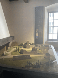 Scale model of the Useldange Castle at the Museum of Models of the Castles and Palaces of Luxembourg at Clervaux Castle, with explanation
