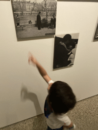 Max with photographs at the Family of Man exhibition at Clervaux Castle