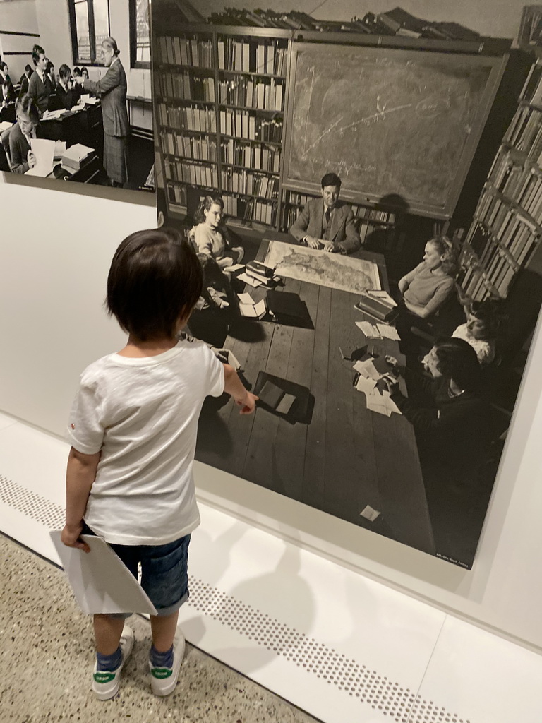 Max with photographs at the Family of Man exhibition at Clervaux Castle