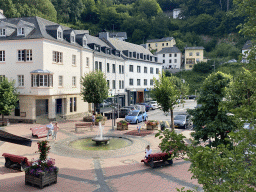 Fountain at the Place de Liberation square, viewed from the staircase from the Place du Marché square