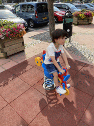 Max on a seesaw at the Place de Liberation square