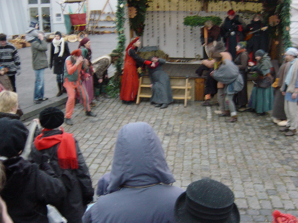 Street artists at the Medieval Market near the Chocolate Museum