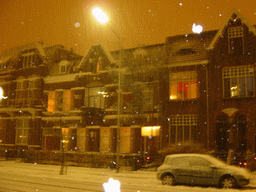 Snowy Stieltjesstraat street in Nijmegen, by night