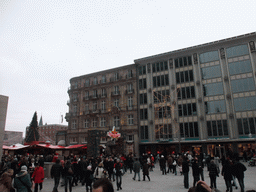 Buildings at the Domkloster street, and the entrance to the Cologne Christmas Market (Weihnachtsmarkt am Kölner Dom)
