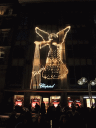 Christmas angel in lights at the front of the Chopard store at the Domkloster street, by night