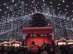Central stage at the Cologne Christmas Market, and the south side of the Cologne Cathedral, by night