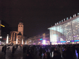 The Ostturm tower of the St. Mariä Himmelfahrt church and the Cologne Central Station, by night