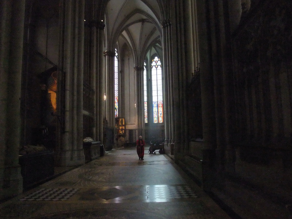 Priest at the left side of the apse of the Cologne Cathedral