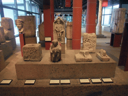 Roman statues, reliefs, busts and stones at the ground floor of the Romano-Germanic Museum