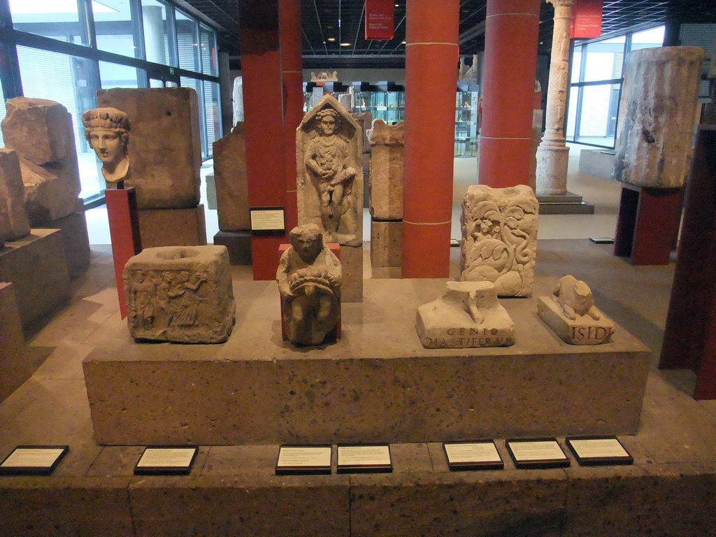 Roman statues, reliefs, busts and stones at the ground floor of the Romano-Germanic Museum