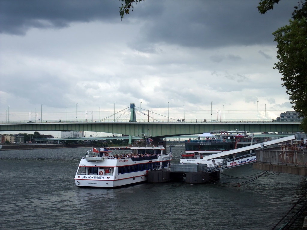 Boats and the Deutzer Brücke over the Rhein river, viewed from the Fischmarkt square