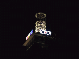 The top of the Cologne Trade Fair Tower, by night