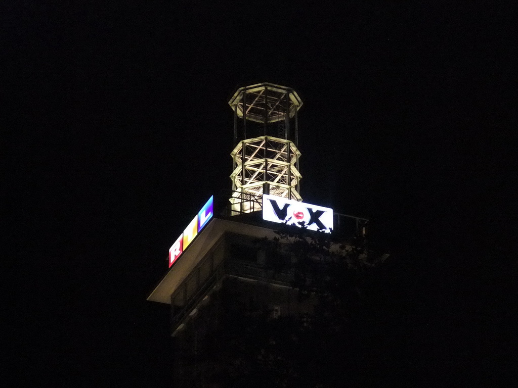 The top of the Cologne Trade Fair Tower, by night