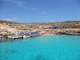 Swimmers at the Blue Lagoon, viewed from the Luzzu Cruises tour boat from Gozo to Comino
