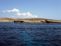 The north coast of Comino, viewed from the Luzzu Cruises tour boat from Comino to Malta