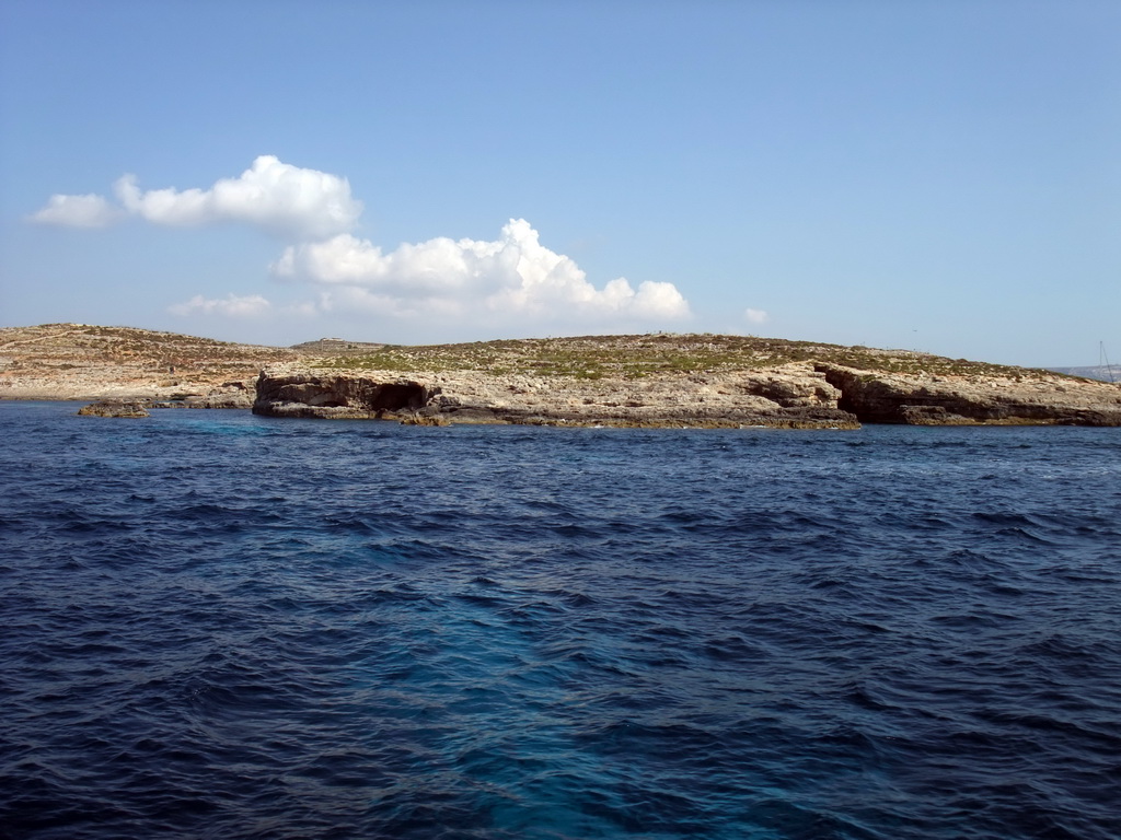 The north coast of Comino, viewed from the Luzzu Cruises tour boat from Comino to Malta