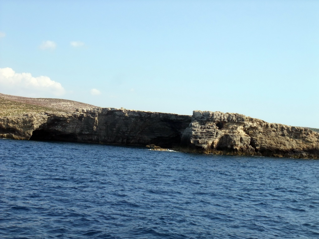 The north coast of Comino, viewed from the Luzzu Cruises tour boat from Comino to Malta