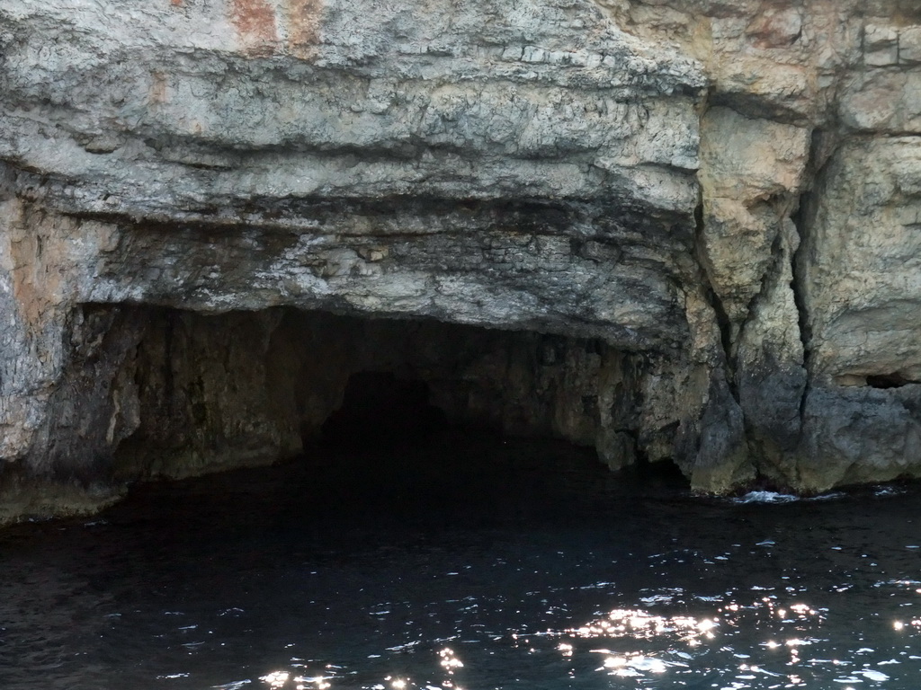 One of the Crystal Caves at the north coast of Comino, viewed from the Luzzu Cruises tour boat from Comino to Malta