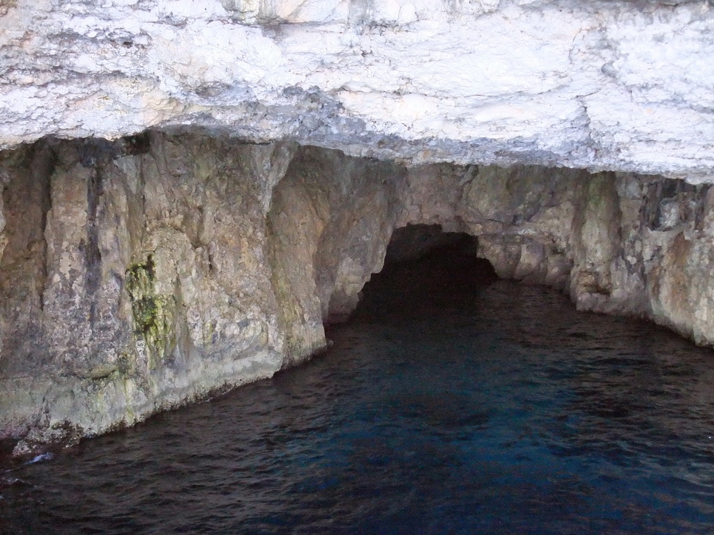 One of the Crystal Caves at the north coast of Comino, viewed from the Luzzu Cruises tour boat from Comino to Malta