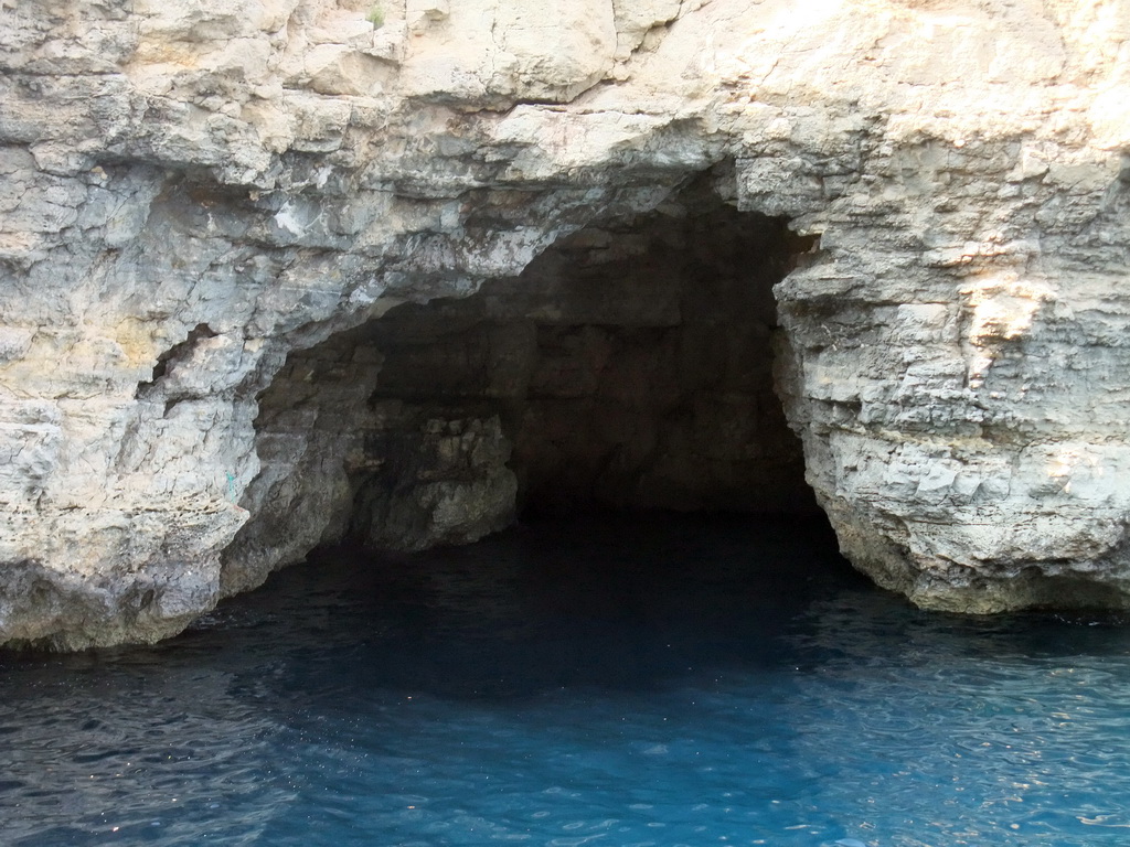 One of the Crystal Caves at the north coast of Comino, viewed from the Luzzu Cruises tour boat from Comino to Malta