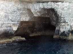 One of the Crystal Caves at the north coast of Comino, viewed from the Luzzu Cruises tour boat from Comino to Malta