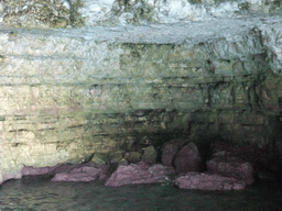 Purple rocks in one of the Crystal Caves at the north coast of Comino, viewed from the Luzzu Cruises tour boat from Comino to Malta