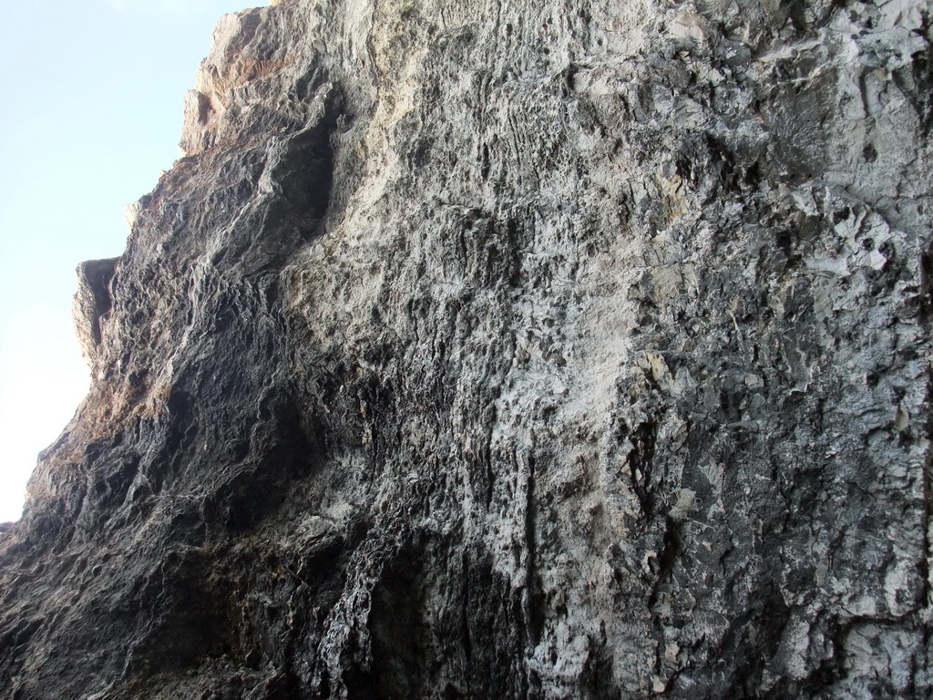 Rocks at one of the Crystal Caves at the north coast of Comino, viewed from the Luzzu Cruises tour boat from Comino to Malta