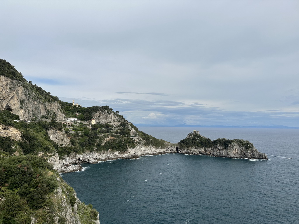 The Torre Capo di Conca tower, the west side of town with the Chiesa San Pancrazio Martire church and the Tyrrhenian Sea, viewed from the parking lot of the Grotta dello Smeraldo cave