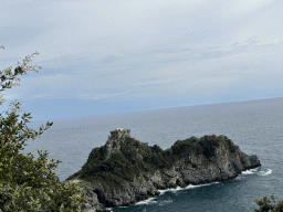 The Torre Capo di Conca tower and the Tyrrhenian Sea, viewed from the rental car on the Via Smeraldo road