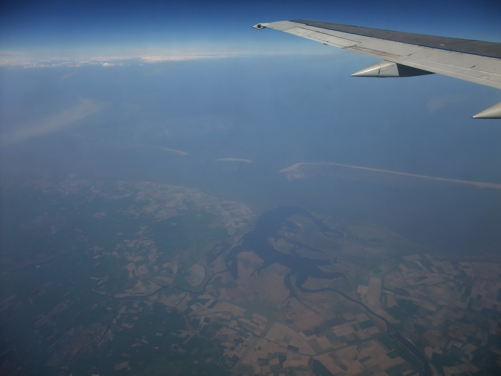 View on the Lauwersmeer lake and the Ameland, Het Rif and Schiermonnikoog islands, from our airplane from Amsterdam to Copenhagen