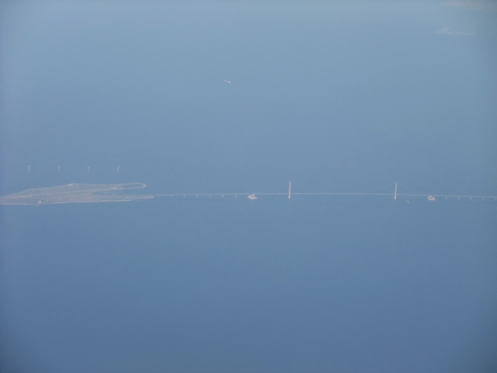 View on the Storebæltsbroen bridge over the Great Belt strait, from our airplane from Amsterdam to Copenhagen