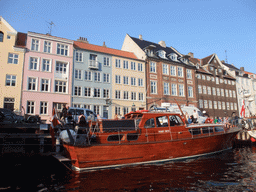 Boats and houses at the north side of the Nyhavn harbour, viewed from the DFDS Canal Tours boat