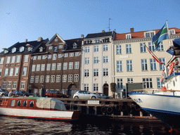 Boats and houses at the north side of the Nyhavn harbour, viewed from the DFDS Canal Tours boat
