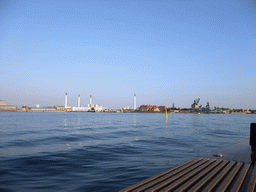 Refshaleøen island and Nyholm island with the Central Guard building, the HMS Peder Skram Ship and the Old Mast Crane at the Old Naval Yard, viewed from the DFDS Canal Tours boat