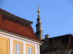 The tower of the Church of Our Saviour and houses in the Christianshavn neighbourhood, viewed from the DFDS Canal Tours boat