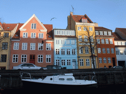 Boat and houses at the Christianshavn Canal, viewed from the DFDS Canal Tours boat