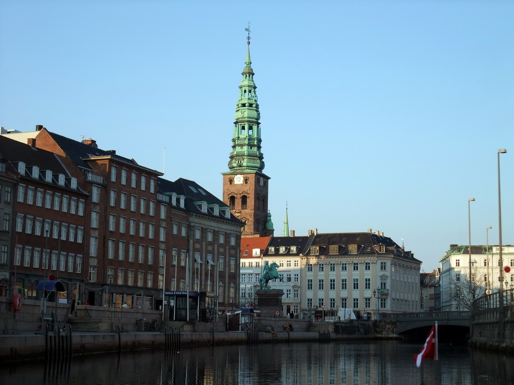 Højbro bridge over the Slotsholmens Canal, Gammel Strand street, Højbro Plads square with the equestrian statue of Absalon and the tower of the Saint Nicholas Church, viewed from the DFDS Canal Tours boat