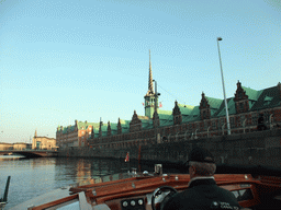 The Stock Exchange (Børsen) with the Dragon Spire Tower and the Børsbroen bridge over the Slotsholmens Canal, viewed from the DFDS Canal Tours boat